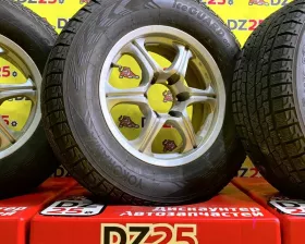 Колеса на дисках Toyota 6x139.7 c шинами Bridgestone 265/65R17