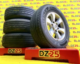 Колеса на дисках Toyota 6x139.7 c шинами Bridgestone 265/65R17