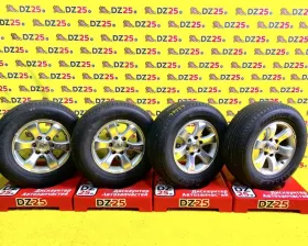 Колеса на дисках Toyota 6x139.7 c шинами Bridgestone 265/65R17