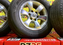Колеса на дисках Toyota 6x139.7 c шинами Bridgestone 265/65R17