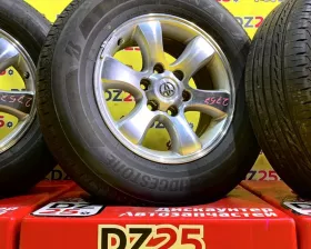 Колеса на дисках Toyota 6x139.7 c шинами Bridgestone 265/65R17