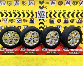 Колеса на дисках Mazda 5x114.3 c шинами Yokohama 235/60R18