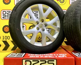 Колеса на дисках Mazda 5x114.3 c шинами Yokohama 235/60R18