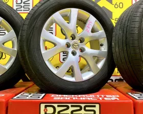 Колеса на дисках Mazda 5x114.3 c шинами Yokohama 235/60R18