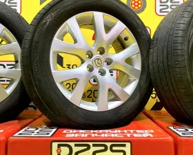 Колеса на дисках Mazda 5x114.3 c шинами Yokohama 235/60R18
