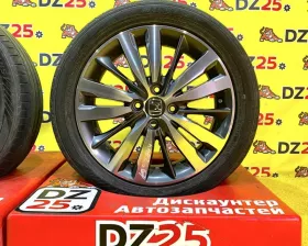 Колеса на дисках Honda 4x100 c шинами Dunlop 185/55R16