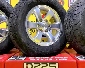 Колеса на дисках Toyota 6x139.7 c шинами Dunlop 265/65R17