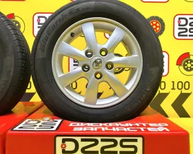 Колеса на дисках Toyota 5x114.3 c шинами Yokohama 195/65R15
