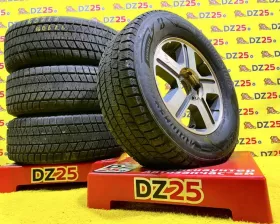 Колеса на дисках Chevrolet 6x127 c шинами Bridgestone 265/65R17