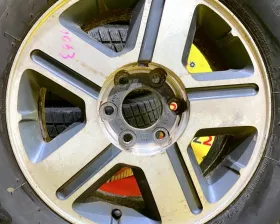 Колеса на дисках Chevrolet 6x127 c шинами Bridgestone 265/65R17