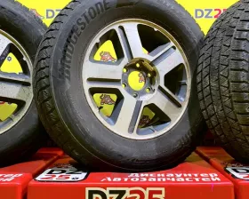 Колеса на дисках Chevrolet 6x127 c шинами Bridgestone 265/65R17