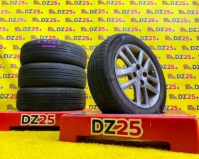 Колеса на дисках Toyota 4x100 c шинами Yokohama 185/60R15