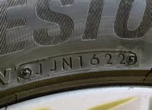 Колеса на дисках Toyota 5x114.3 c шинами Bridgestone 235/50R18