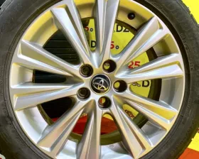 Колеса на дисках Toyota 5x114.3 c шинами Bridgestone 235/50R18