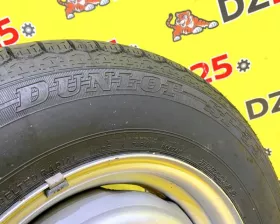 Колесо на диске Toyota 6x139.7 c шиной Dunlop 215/70R15