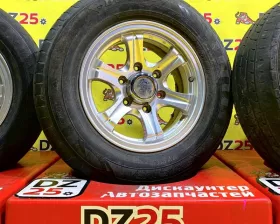 Колеса на дисках Toyota 6x139.7 c шинами Dunlop 215/70R15