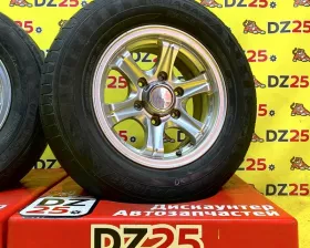 Колеса на дисках Toyota 6x139.7 c шинами Dunlop 215/70R15