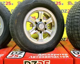 Колеса на дисках Weds 6x139.7 c шинами Dunlop 215/70R15
