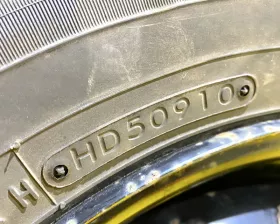 Колесо на диске Nissan 4x114.3 c шиной Toyo 165/80R14