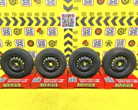 Колеса на дисках Nissan 4x114.3 c шинами Goodyear 165/80R14