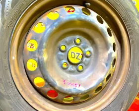 Колесо на диске Toyota 5x100 c шиной Yokohama 185/60R15
