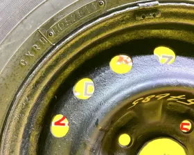 Колесо на диске Nissan 4x114.3 c шиной Toyo 165/80R14