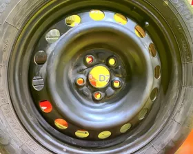 Колеса на дисках Toyota 5x100 c шинами Bridgestone 185/60R15