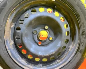 Колеса на дисках Honda 4x100 c шинами Dunlop 185/60R15