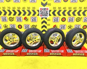 Колеса на дисках Mitsubishi 5x114.3 c шинами Yokohama 215/65R16