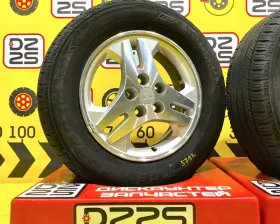 Колеса на дисках Mitsubishi 5x114.3 c шинами Yokohama 215/65R16