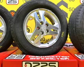 Колеса на дисках Mitsubishi 5x114.3 c шинами Yokohama 215/65R16