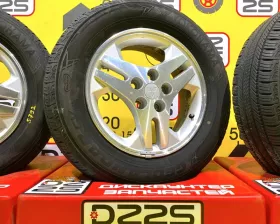 Колеса на дисках Mitsubishi 5x114.3 c шинами Yokohama 215/65R16