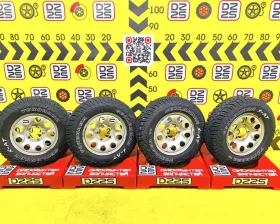 Колеса на дисках Suzuki 5x139.7 c шинами Yokohama 195/80R15