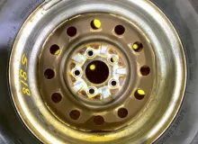 Колеса на дисках Nissan 5x114.3 c шинами Bridgestone 185/80R14