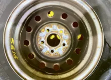 Колеса на дисках Nissan 5x114.3 c шинами Bridgestone 185/80R14