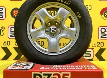 Колесо на диске Toyota 5x114.3 c шиной Bridgestone 215/65R16