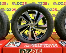 Колеса на дисках Honda 5x114.3 c шинами Dunlop 185/65R15