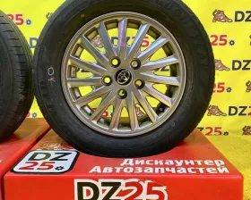 Колеса на дисках Toyota 5x114.3 c шинами Goodyear 195/65R15