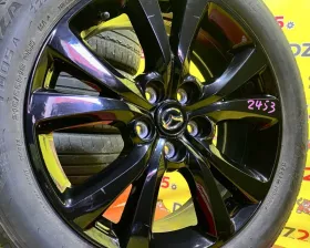Колеса на дисках Mazda 5x114.3 c шинами Bridgestone 215/55R18