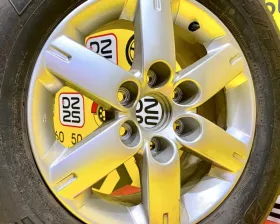 Колесо на диске Mitsubishi 6x139.7 c шиной Bridgestone 265/65R17