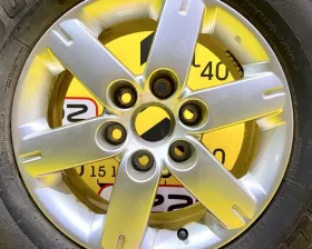 Колесо на диске Mitsubishi 6x139.7 c шиной Bridgestone 265/65R17