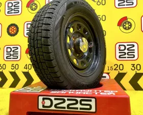 Колесо на диске Toyota 6x139.7 c шиной Dunlop 215/65R16