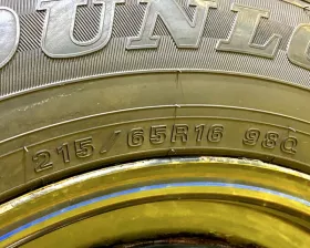 Колесо на диске Toyota 6x139.7 c шиной Dunlop 215/65R16