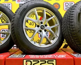 Колеса на дисках Schneder 5x114.3 c шинами Bridgestone 235/60R18